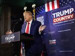 Former President Donald Trump speaks at campaign campaign event in Ankeny, Iowa.