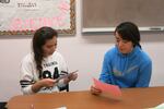 Jennifer Rodriguez (left) and Edith Velasco take an oral Spanish exam at Riverside High School in Boardman. Passing the test gives them 12 college credits.