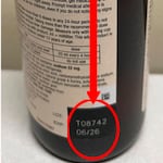 This photo provided by U.S. Food & Drug Administration shows the location of a lot number of recalled Robitussin cough syrup. The maker is recalling several lots of its medicine Thursday, due to contamination that could pose a serious risk to people with weakened immune systems.