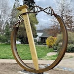 Metal sculpture entitled "Golden Connection" in Ashland, Oregon, created by Cobalt Designworks, 2022.