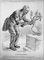 In this black-and-white political cartoon, President Woodrow Wilson hands a thick, heavy olive branch, representing the League of Nations, toward the open beak of a relatively smaller dove of peace, in 1919.