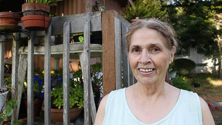 Charlotte White in her garden in the Rainbow Rock Village Mobile Home Park. White's home was built in 1976 and now has problems with rot and mold.