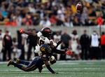 Oregon State wide receiver Zeriah Beason (18) has the ball tipped by California cornerback Isaiah Young (41) that led to an interception during the first half of an NCAA college football game in Berkeley, Calif., Saturday, Oct. 30, 2021.