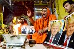 Priests perform 'havan' for the victory of US presidential candidate Donald Trump in the upcoming US Presidential elections, at Maa Baglamukhi Shakti Peeth, Dilshad Garden, in New Delhi on November 3.