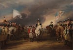 This painting by John Trumbull depicts the British surrender at Yorktown, marking the end of the Revolutionary War. The defeated British army marches between the Americans on the right, led by General George Washington, and the French on the left, led by General Jean-Baptiste Rochambeau. At the center, on horseback, Major General Benjamin Lincoln, Washington’s second-in-command, accepts the official surrender from General Lord Cornwallis’s deputy, General Charles O’Hara.