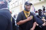 Tusitala "Tiny" Toese speaks at dueling demonstrations gather in downtown Portland, Ore., Saturday, Aug. 22, 2020. Groups like Proud Boys and Patriot Prayer showed up downtown to oppose monthslong demonstrations against systemic racism and police brutality.