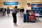 Voters drop off their ballots on Election Day at City Hall in San Francisco, Calif.