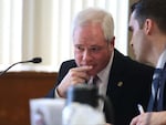 Judge Vance Day, left, speaks with his attorney Mike De Muniz during a pre-trial hearing at the Marion County Courthouse in Salem on Tuesday, March 6, 2018.
