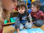 FILE: Ioan McClain, 4, center, and Julian Orizola, 5, at Escuela Viva Community School’s Southeast Portland location, Oct. 26, 2023. 