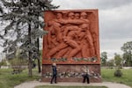 People at a World War II monument on Victory Day in Chișinău, Moldova, May 9, 2023. Many from Moldova’s Russian-speaking population remain nostalgic for the days of the former Soviet Union.