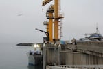 A fishing vessel sits below the Port of Port Orford's dolly dock, Aug. 5, 2026.