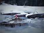 Ivana Maclay cold dips in frozen Mirror Lake in the Mt. Hood National Forest. By cold dipping, Ivana feels a closer connection to nature, and to her own body.