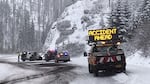 Emergency crews respond to a crash on Oregon's snowy Santiam Pass at milepost 77 in on Tuesday, Nov. 26, 2019.