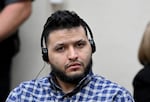 Jose Ibarra listens through an interpreter during his trial at Athens-Clarke County Superior Court, Wednesday, Nov. 20, 2024, in Athens, Ga.