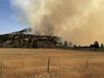 In a photo provided by the Wasco County Sheriffs Department, the Cram Fire burns a hillside. Smoke from the fire is worsening air quality in Central Oregon.