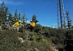 Crews working on the Moss Mountain Fire near Oakridge clear wildfire fuel from Wolf Mountain in the Willamette National Forest. With wildfires waning in the area, the U.S. Forest Service has reopened some popular recreation areas.