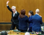 Governor Tina Kotek waves to the crowd, followed by her wife, Aimee Kotek Wilson, after her inauguration at the Oregon Capitol in Salem, Ore., Jan. 9, 2023.