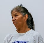 Victoria Nelson speaks to the press about her and her brother’s recent encounters with the Burdoin wildfire in Grace Baptist Church in White Salmon, Wash., July 24, 2025. Overnight, damages to local homes and properties have continued to rise following a worsening in weather conditions.