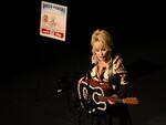 Dolly Parton performs at an event celebrating the Imagination Library in Washington Aug. 15, 2023. The country music star and Rock & Roll Hall of Famer didn't perform her biggest hits, but instead shared songs with a personal connection to the program that provides free books for children.