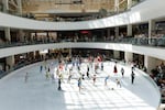 All the skaters and coaches gather on the ice at the end of the final show at the Lloyd Center Ice Rink, May 31, 2026.