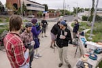 Lance Poehler (blue cap), is one of the organizers for the Blumenauer Bridge breakfast. While coffee and breakfast are appreciated, many stop for the community.