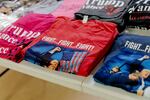 Trump signs and merchandise for sale inside the America First Republicans meeting, a group of Republicans aligned with the Trump wing of the party on Oct. 3, 2024 in Hillsdale, Mich.