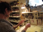 Catharine Newell in her home studio. She says her transition into fused glass has been nothing short of "transformative", and she credits Bullseye for making it possible.