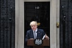 British Prime Minister Boris Johnson makes a resignation speech outside 10 Downing St. in London on Thursday. Johnson is bowing out after his government hemorrhaged dozens of ministers and junior aides, and members of his Cabinet told him he should step down.