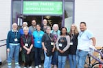 Gladstone Food Pantry staff and volunteers celebrate the pantry's reopening at Kraxberger Middle School on Oct. 8, 2025, in Gladstone, Ore.