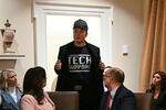 Leader of the Trump administration team called the Department of Government Efficiency, Elon Musk, wears a shirt that says "Tech Support" as he speaks during a Cabinet meeting with President Trump at the White House on Feb. 26.