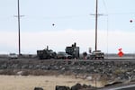 FBI officials have established checkpoints around the Malheur National Wildlife Refuge as a handful of armed militants remain inside.