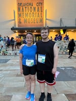 Amy Downs poses in front of the Oklahoma City bombing memorial with her son Austin.