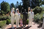 Royal Rosarians -- and one honorary Rosarian -- pose for a photo at the 100 year celebration of the International Rose Test Garden in Portland.