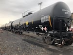 Trains containing petroleum crude oil on a rail line outside of Zenith Terminals, sandwiched between the Willamette River and Forest Park in Portland's northwest industrial district.