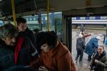 Evacuees from the city of Pokrovsk arrive at a train station in Pavlohrad, Ukraine, on Oct. 19. Pokrovsk, a coal mining center in eastern Ukraine, is under frequent Russian artillery barrages and aerial attacks.