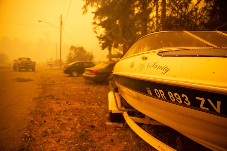 A Bayliner named "My Sanity" remains intact after the Santiam Fire nearly wiped out a neighborhood near Gates, Ore., Sept. 9, 2020.