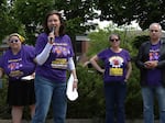 Jennifer Smith speaks at a rally at the Erb Memorial Union on May 15, 2026.