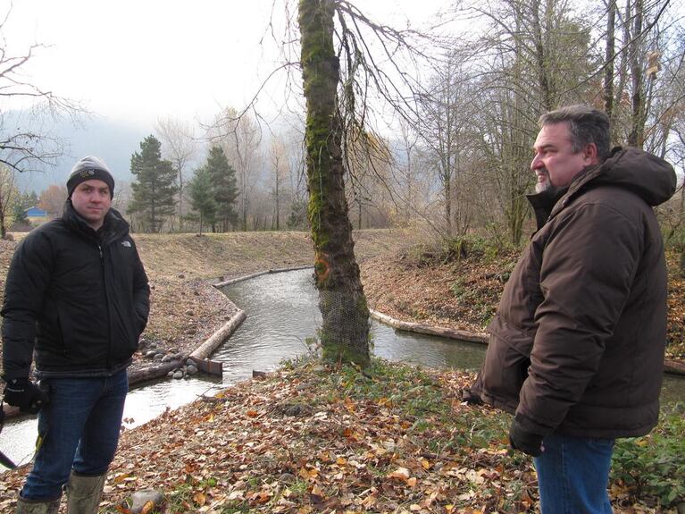 Peter Barber (L) and Scott Bettin at the Hamilton Springs chum habitat improvement project their organizations are working on. Barber is with the Lower Columbia Fish Enhancement Group and Bettin is with the Bonneville Power Administration.