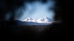 North Sister and Middle Sister are seen from Pilot Butte in Bend, Ore., Wednesday, Dec. 23, 2020.
