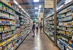 People shop at a supermarket in Santa Monica, California, on September 13, 2022.