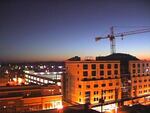 A construction crane is seen over downtown Bend in this 2009 file photo. Candidates for Bend City Council had a lot to say about the city's plans for dealing with tis rapid growth at a debate Monday, Oct. 3, 2016. 