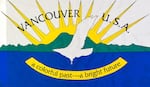 The current city flag of Vancouver, Wash., features a white bird flying over a river and mountains under a rising sun.