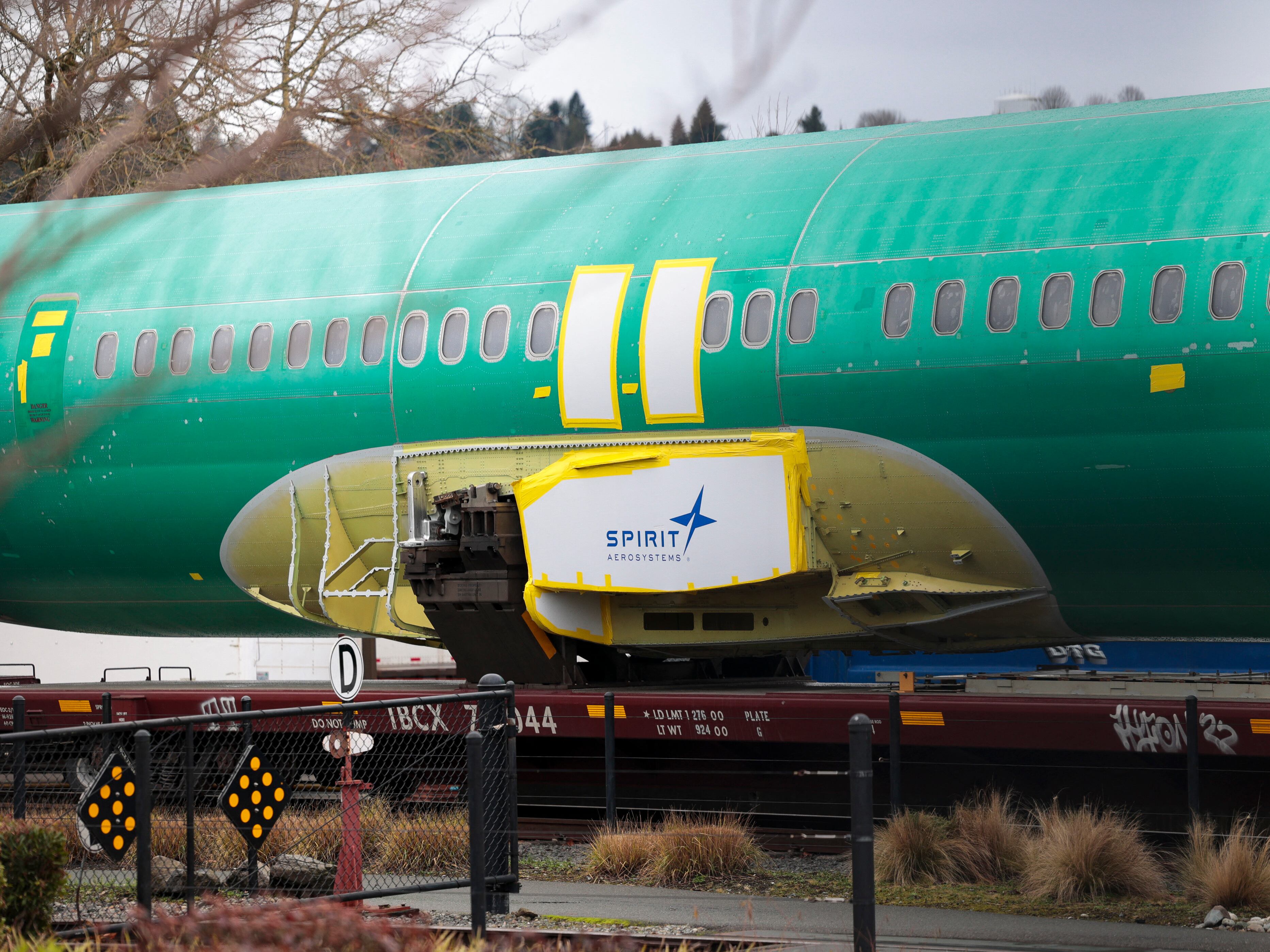 Joshua Dean, who died on Tuesday, had gone public with his concerns about defects and quality-control problems at Spirit AeroSystems, a major supplier of parts for Boeing. Here, a Spirit AeroSystems logo is seen on a 737 fuselage sent to Boeing's factory in Renton, Wash., in January.