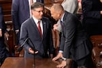 House Speaker Mike Johnson, R-La., left, speaks with House Minority Leader Hakeem Jeffries as the House of Representatives meets to elect a speaker and convene the new 119th Congress at the Capitol in Washington, Friday, Jan. 3, 2025.