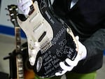 Kurt Cobain's smashed Fender Stratocaster is displayed at Julien's Auctions in Gardena, Calif., on May 2 ahead of Julien's "Music Icons" auction of over 1,200 items from rockhistory and exclusive artist collections.