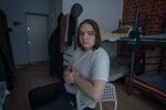 Ivan Sarancha sits in his room in a dormitory set up by the charity Save Ukraine, in Gatne, Kyiv region.