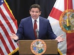 Florida Gov. Ron DeSantis delivers remarks during a press conference at the Central Florida Tourism Oversight District headquarters at Walt Disney World, in Lake Buena Vista, Fla., Thursday, Feb. 22, 2024.