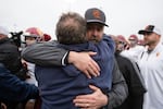 Central Catholic head coach Steve Pyne hugs Lake Oswego head coach Steve Coury after the game. The Central Catholic Rams played the Lake Oswego Lakers at Hillsboro Stadium in Hillsboro, Oregon, on Dec. 7, 2019. The Rams defeated the Lakers 49-28.