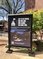 FILE: A sign in downtown Ashland advertises Oregon Shakespeare Festival's emergency fundraising campaign in 2023.