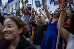 Israelis react as they wait for the release of Israelis still held in Gaza at Hostages Square in Tel Aviv early on Oct. 13, 2025.